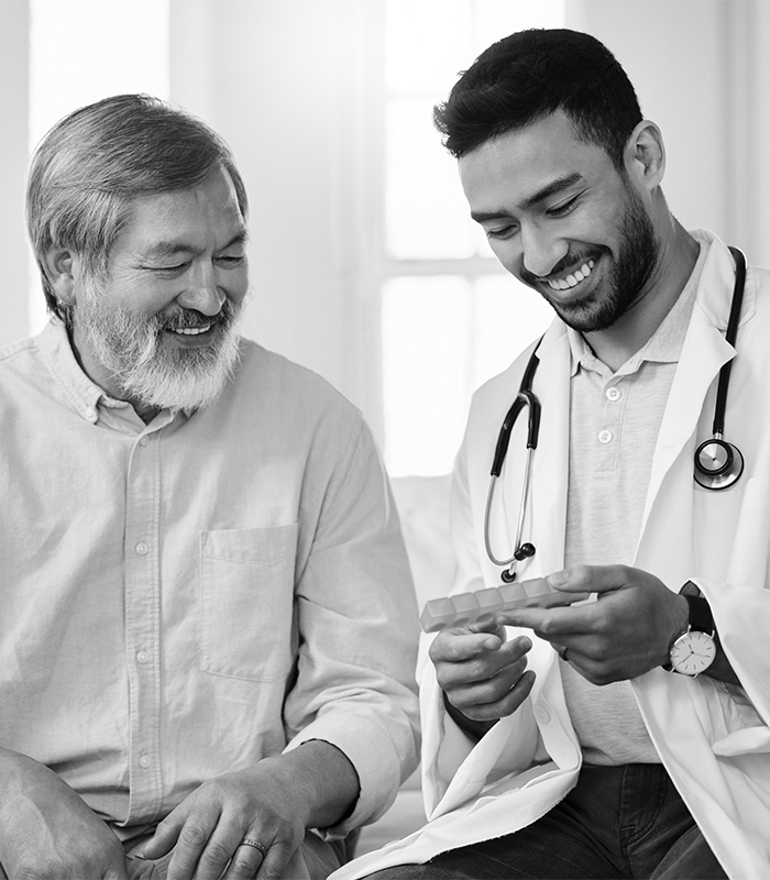 a group of people looking at a phone